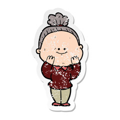 distressed sticker of a cartoon happy old woman