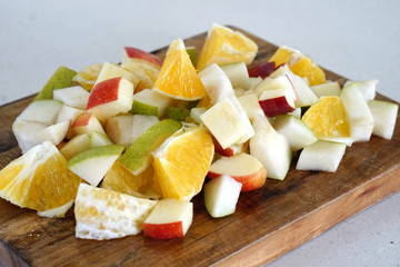 orange pear and apple prepared for a fresh and nutritious salad