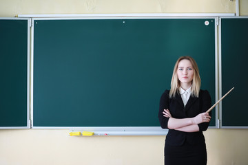 Young girl teacher in primary school