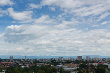 white cloud on blue sky above the town, aerial view cityscape