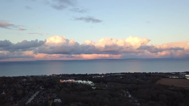 Drone footage in The Blue Mountains, Ontario at sunset over Georgian Bay.