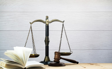 Justice Scales and wooden gavel . Justice concept