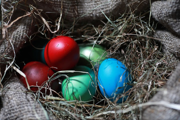 Easter painted eggs on burlap
