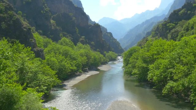 Panorama of the mountains in Greece from the bridge of Konitsa over Aoos river Zagori. Greece. Europe. 4K UHD video	