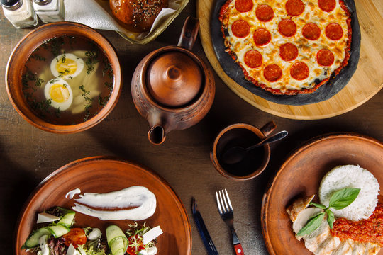 The Table Is Set For A Four Course Meal.