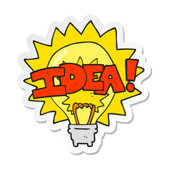 sticker of a cartoon idea light bulb symbol