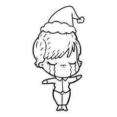 Fototapeta premium line drawing of a woman crying wearing santa hat