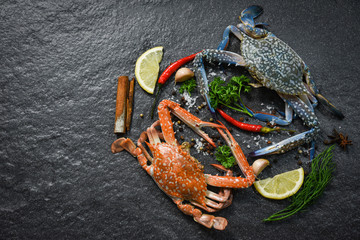 Fresh raw Crab cooked shellfish seafood and Steamed crab with herbs and spices