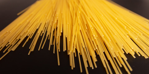 Pasta dough on a black background