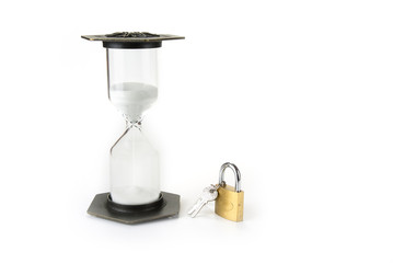 Hourglass with the lock. Stop the time concept.