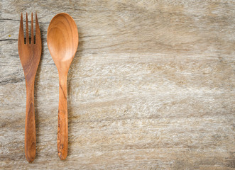 Wooden spoon and fork kitchenware set on wooden table / Zero waste use less plastic concept