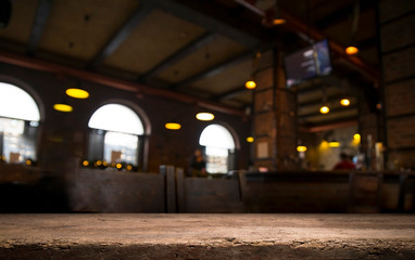 Beer barrel with beer glasses on a wooden table. The dark brown background.