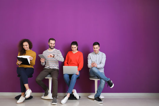 Young people waiting for job interview indoors