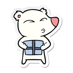 sticker of a cartoon christmas polar bear