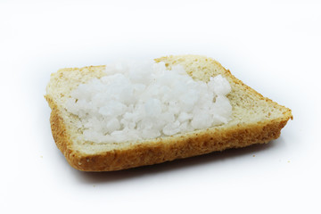 salt on slice breads isolated on white background.
