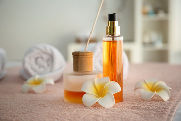 Cosmetic products on table in spa salon