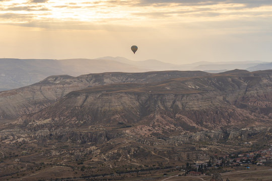 Cappadocia skyline with hot air bollon riding in Cappadocia, Turkey.