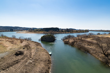 蛇行する北上川と合流する二股川
