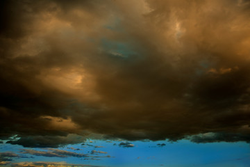 Naklejka na ściany i meble Dramatic Sky Background. Stormy Clouds in Dark Sky. Moody Cloudscape.