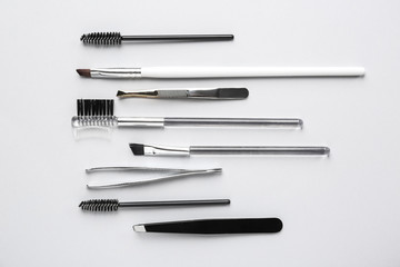 Set of tools for eyebrows correction on white background