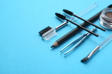 Set of tools for eyebrows correction on color background