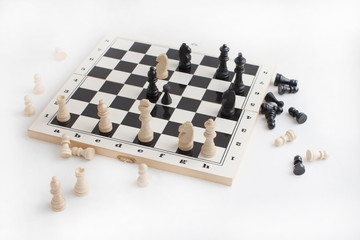 Chess board with chess figures on white background.