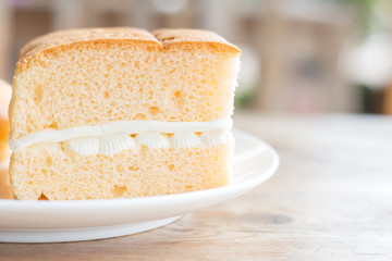 chiffon cake with white cream in cafe
