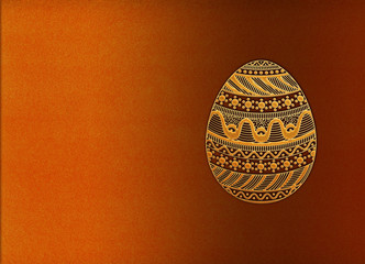 easter egg with ornaments on the textured background