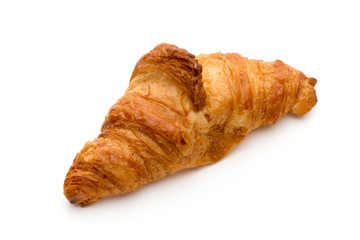 Tasty buttery croissants on the white background.