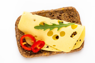 Sandwich with lettuce, cheese on white background.