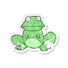 retro distressed sticker of a cartoon frog
