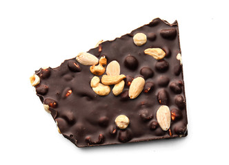 Tasty dark chocolate with nuts on white background