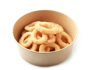 Cardboard bowl with tasty onion rings on white background