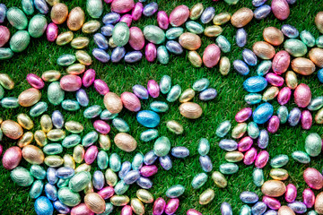 Fototapeta na wymiar color Chocolate Easter eggs on grass