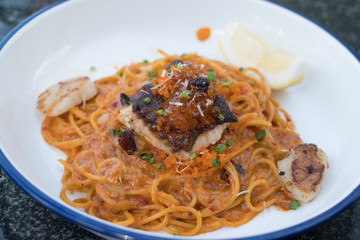 spaghetti spicy sauce with salmon and seashell