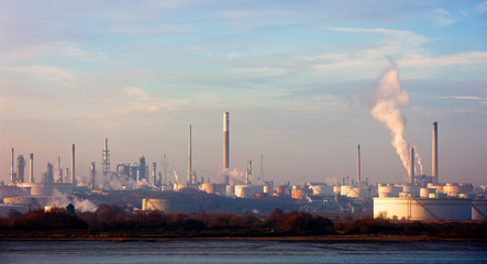 Early morning light over the oil refinery, Fawley, Hampshire, England, UK.