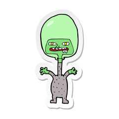 sticker of a cartoon space alien