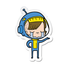 sticker of a cartoon crying astronaut girl