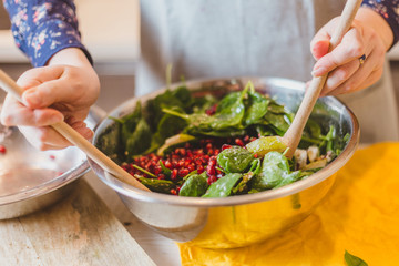 Homemade cooking utensils for a large group of guests - a festive salad