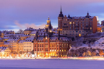 Snow on old building in winter Stockholm on sunrise