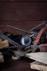 Vintage instrument on the Old Dark Wooden Table. Father's Day Concept