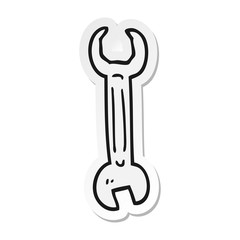 sticker of a cartoon spanner