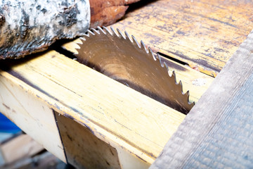 old rusty wood sawing machine, old type circular saw