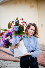 Bouquet of flowers in bag.