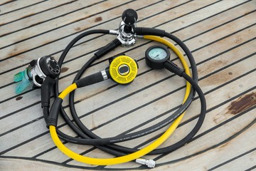 Diving regulators and mouthpiece on boat deck
