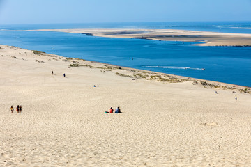 People on the Dune of Pilat, the tallest sand dune in Europe. La Teste-de-Buch, Arcachon Bay,...