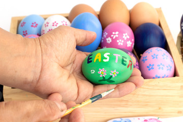Fototapeta na wymiar easter eggs in hand