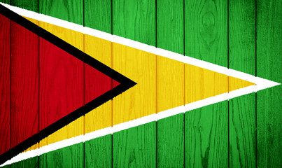 Flag of Guyana on wooden background