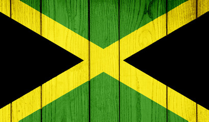 Flag of Jamaica on wooden background - obrazy, fototapety, plakaty