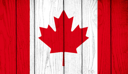 Flag of Canada on wooden background